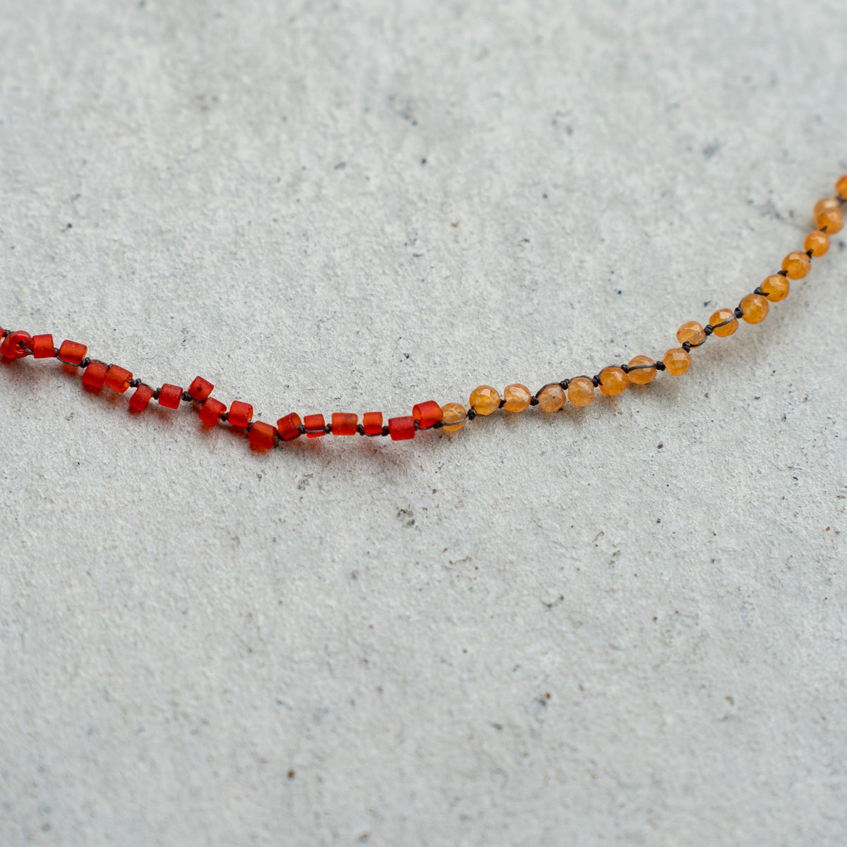 Melanie DeCourcey  Aventurine and Pakistan red glass beads DNA double bracelet