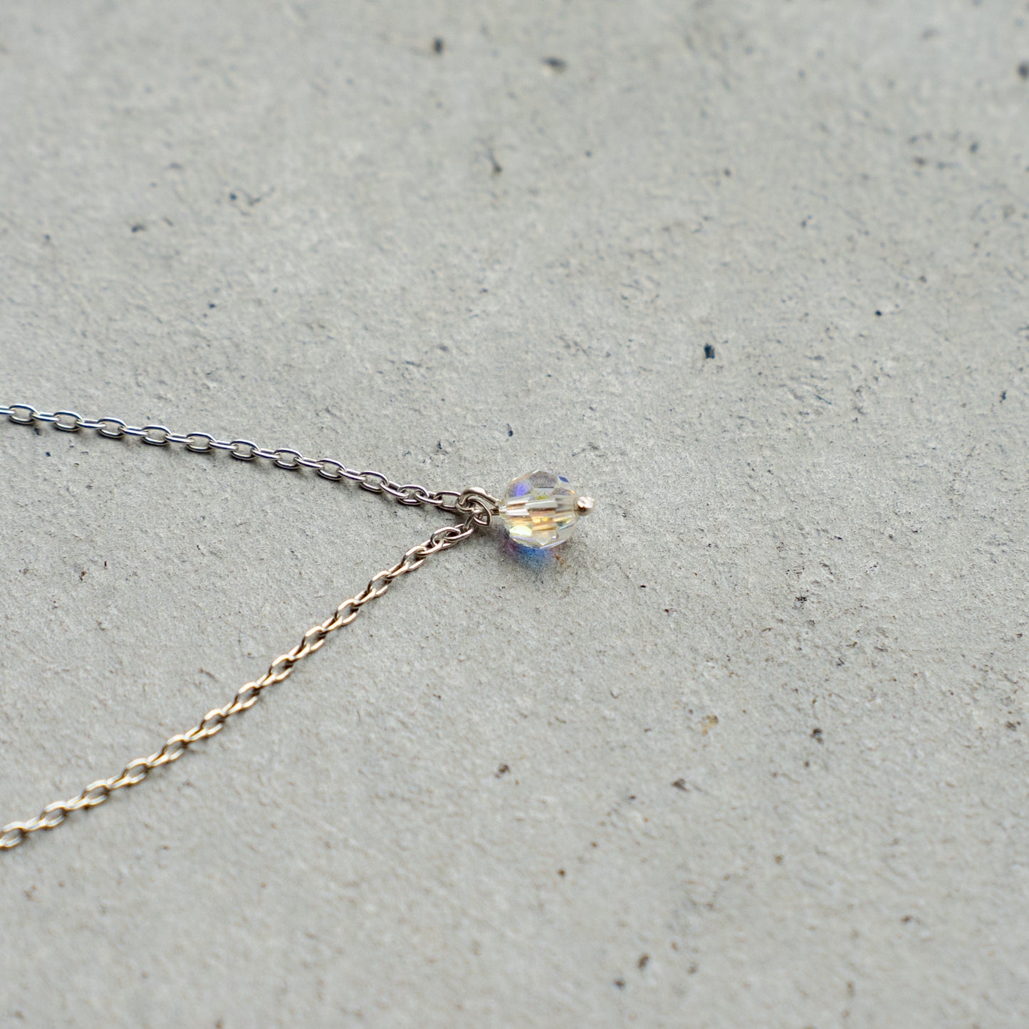Melanie DeCourcey Silver chain with floating with Chrystal