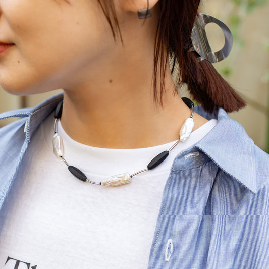 Melanie DeCourcey   Black mother of pearl, Czech glass beads, black spinel