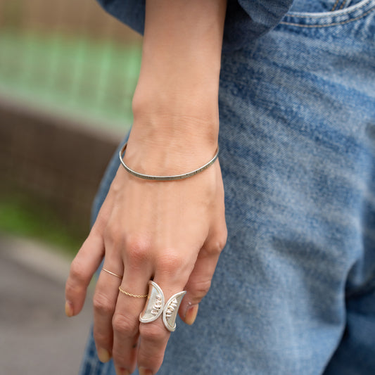 Melanie DeCourcey  Silver bracelet with chain closure "Never stop dreaming butterflies"