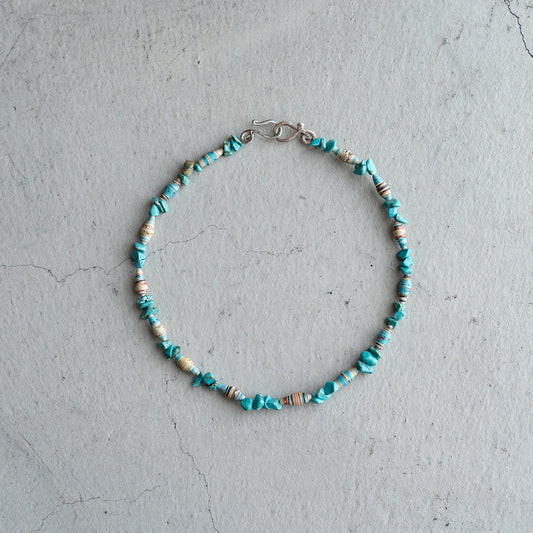 Melanie DeCourcey   Turquoise and multicolor African paper beads alternating