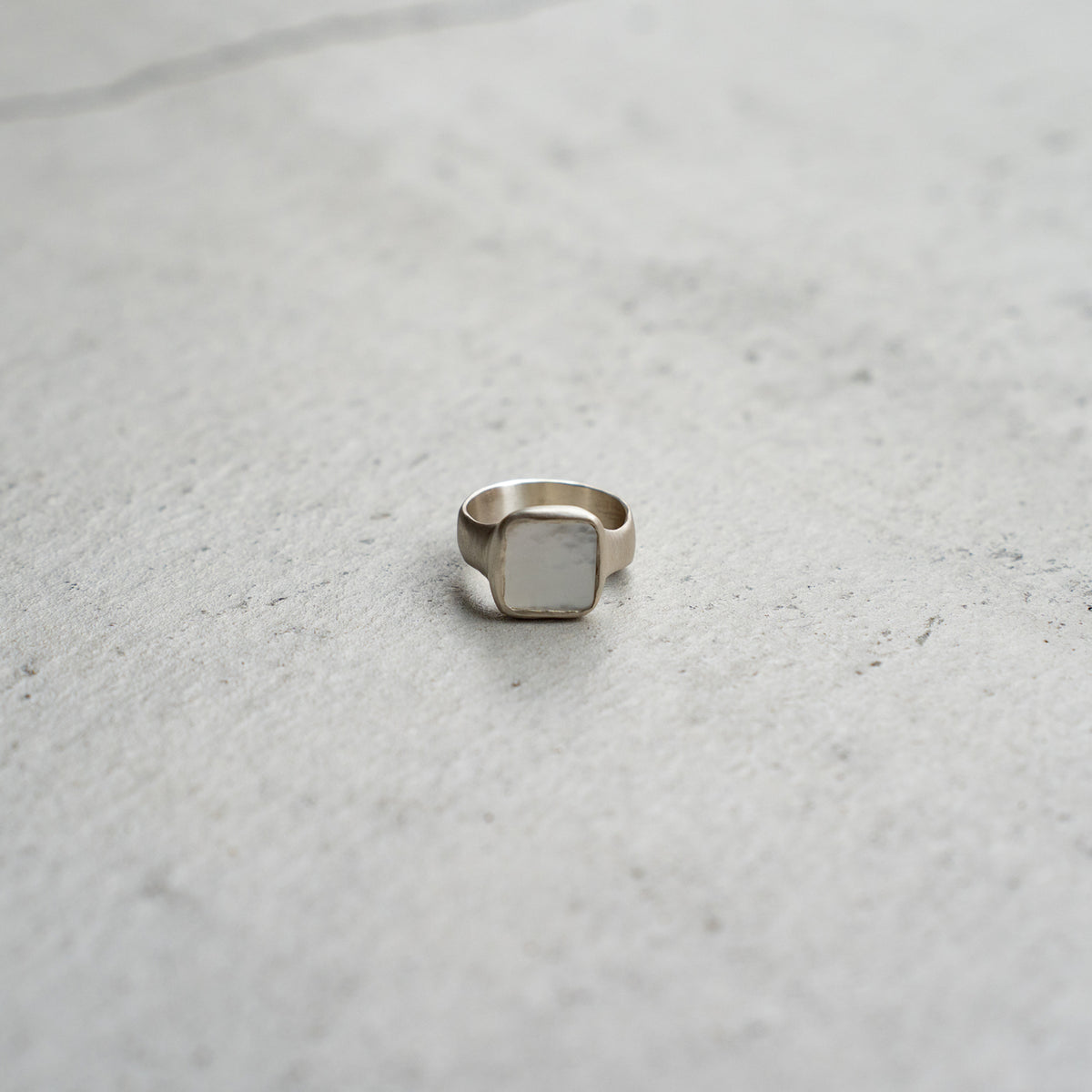 Melanie Decourcey  Silver ring with white square mother of pearl