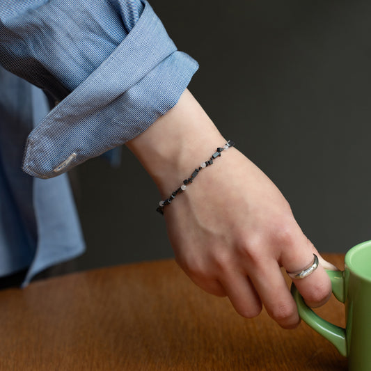 Melanie DeCourcey   DNA different shape hematite and rose quartz blacelet