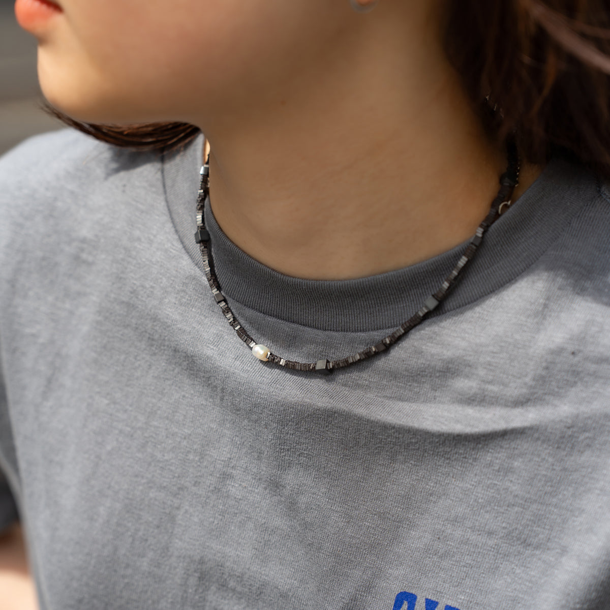 Melanie DeCourcey   Different shape Hematite with pearl center