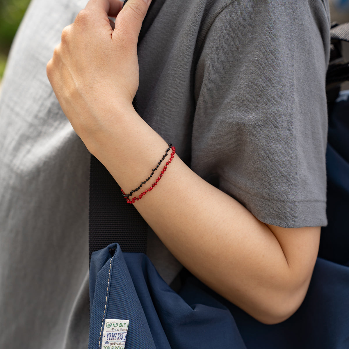 Melanie DeCourcey   Dyed coral and black tourmaline DNA double bracelet