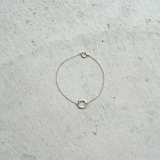 Melanie DeCourcey  Silver chain with small silver square bracelet
