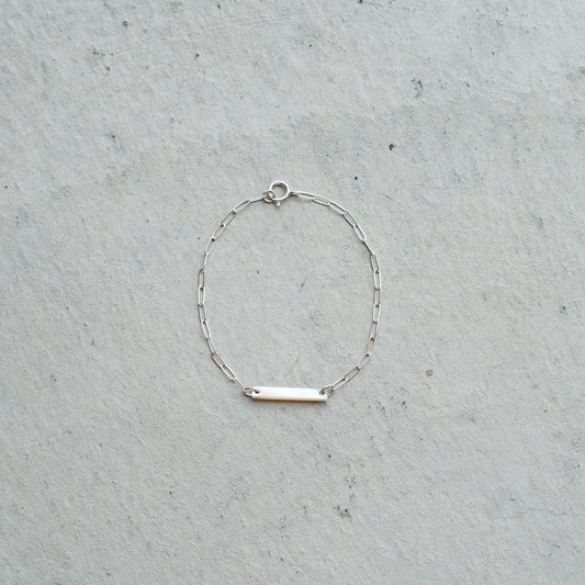 Melanie DeCourcey  Silver chain with long white mother of pearl square