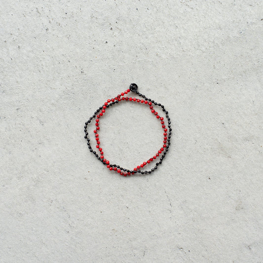 Melanie DeCourcey   Dyed coral and black tourmaline DNA double bracelet