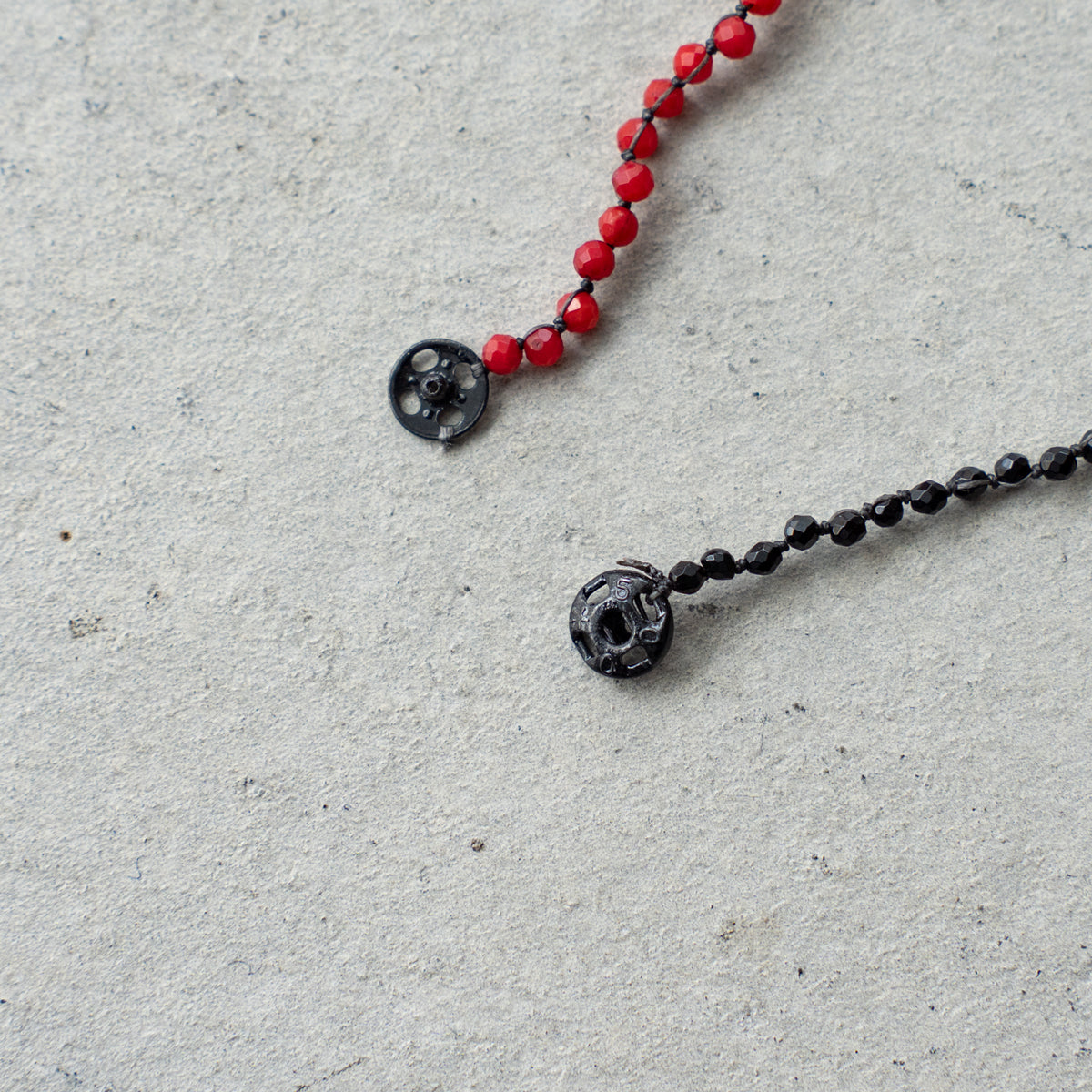 Melanie DeCourcey   Dyed coral and black tourmaline DNA double bracelet