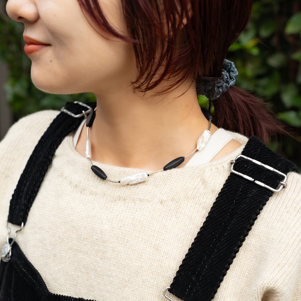 Melanie DeCourcey   Black mother of pearl, Czech glass beads, black spinel