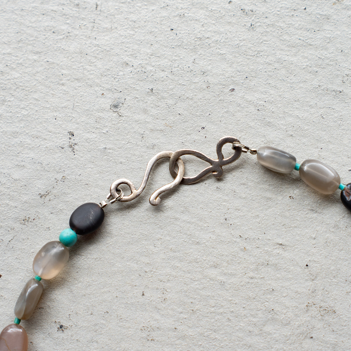 Melanie DeCourcey   Agate, moonstone, small turquoise, and pearl