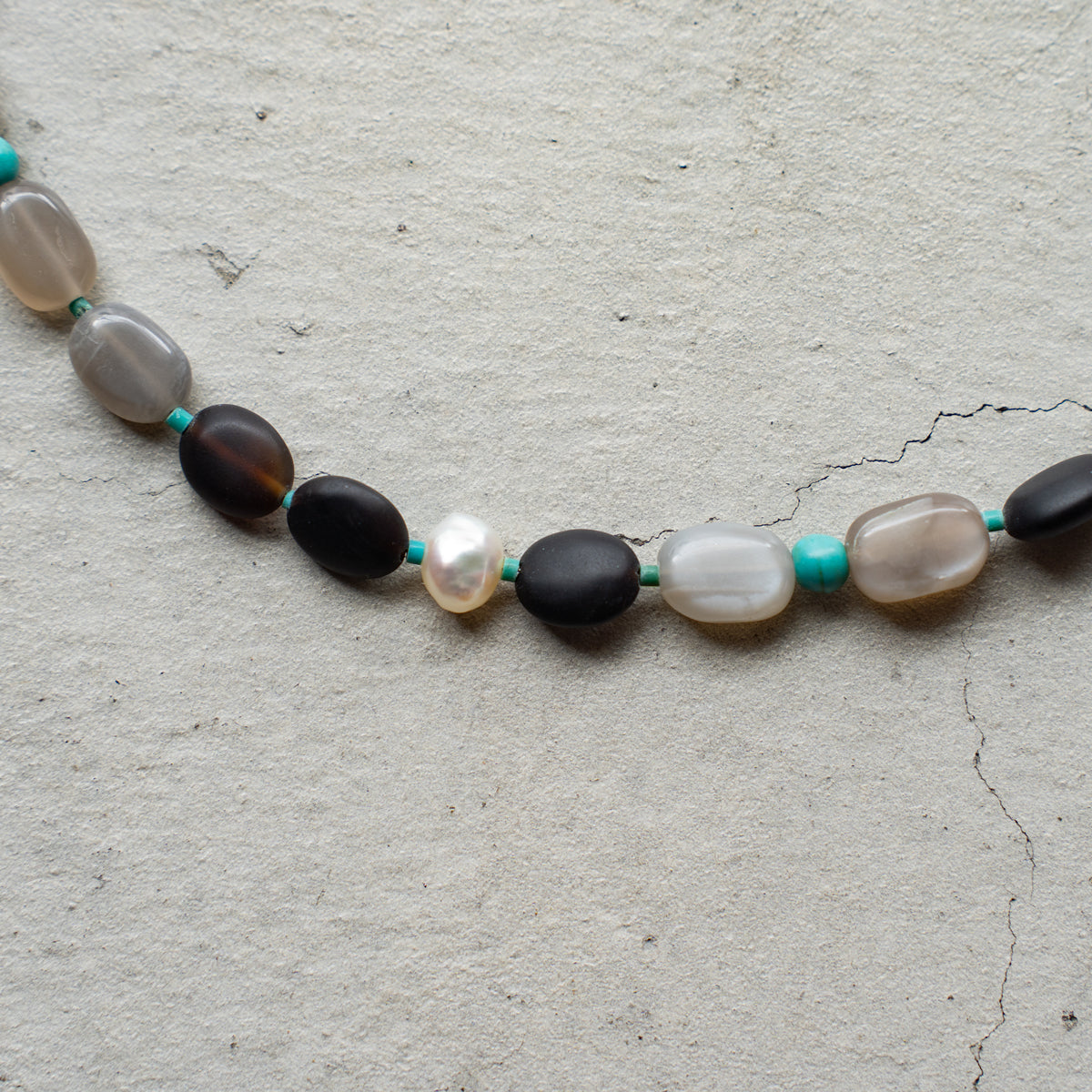 Melanie DeCourcey   Agate, moonstone, small turquoise, and pearl