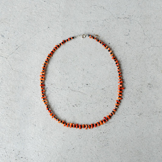Melanie DeCourcey   Black spinel cubes alternating with coral beads
