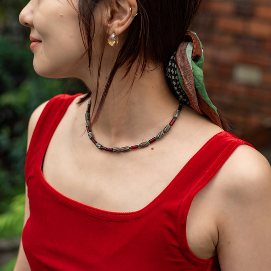Melanie DeCourcey   Different African glass beads alternating with green agate