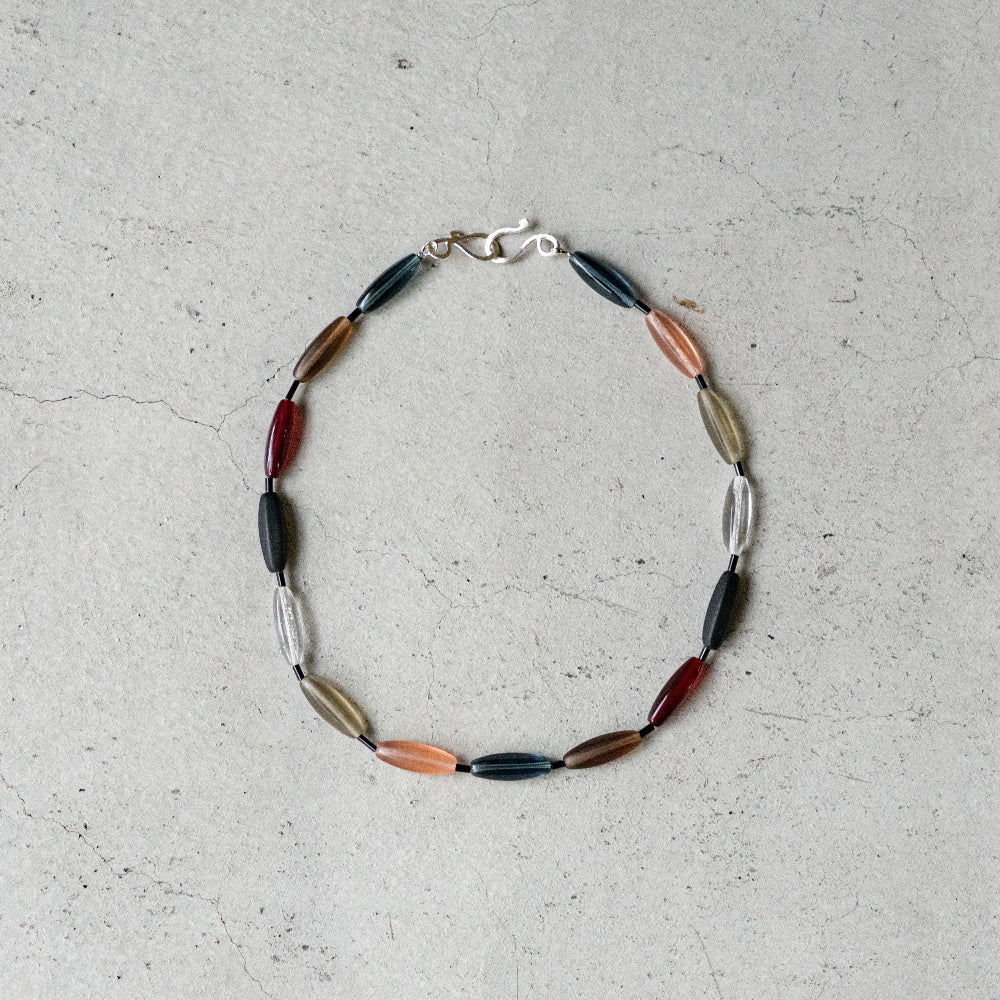 Melanie Decourcey  Multicolor Czech glass beads with onyx tubes