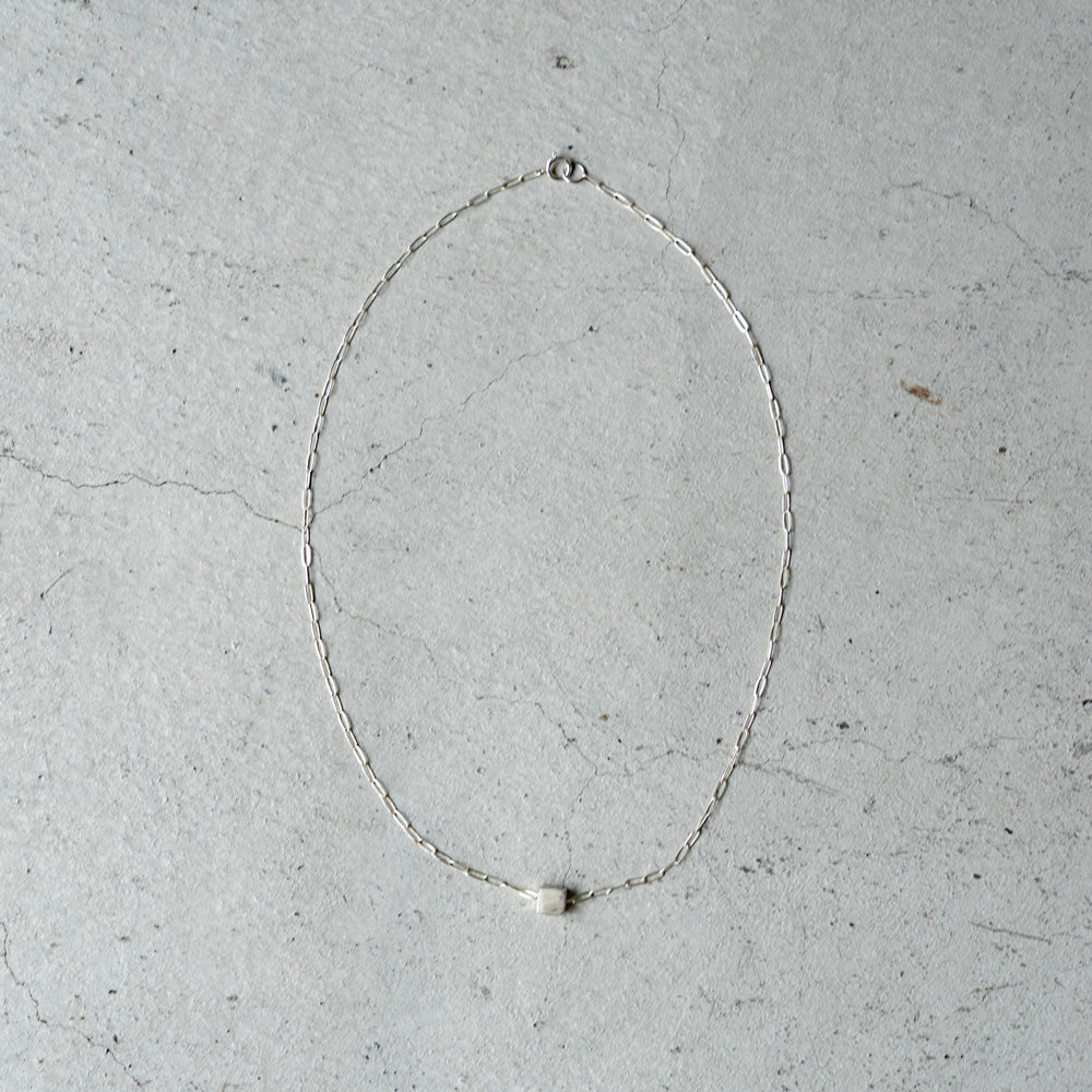 Melanie DeCourcey   Silver cube on chain